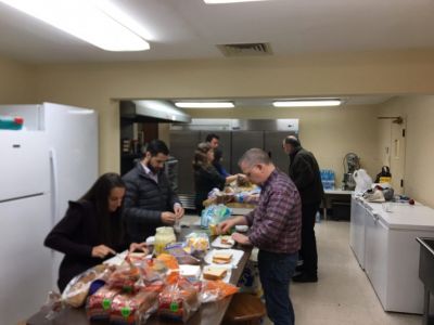 AMEN group from St. Basil Orthodox Church in Metairie, LA preparing sandwiches with the youth.